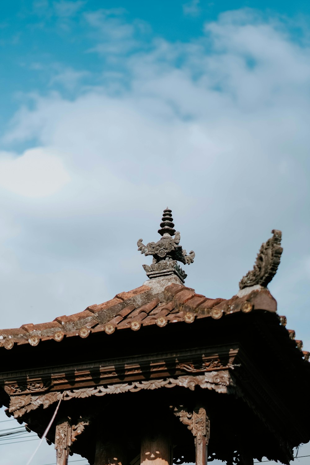 a building with a statue on top