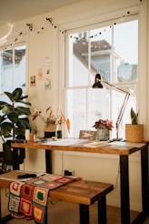 a room filled with furniture and a large window
