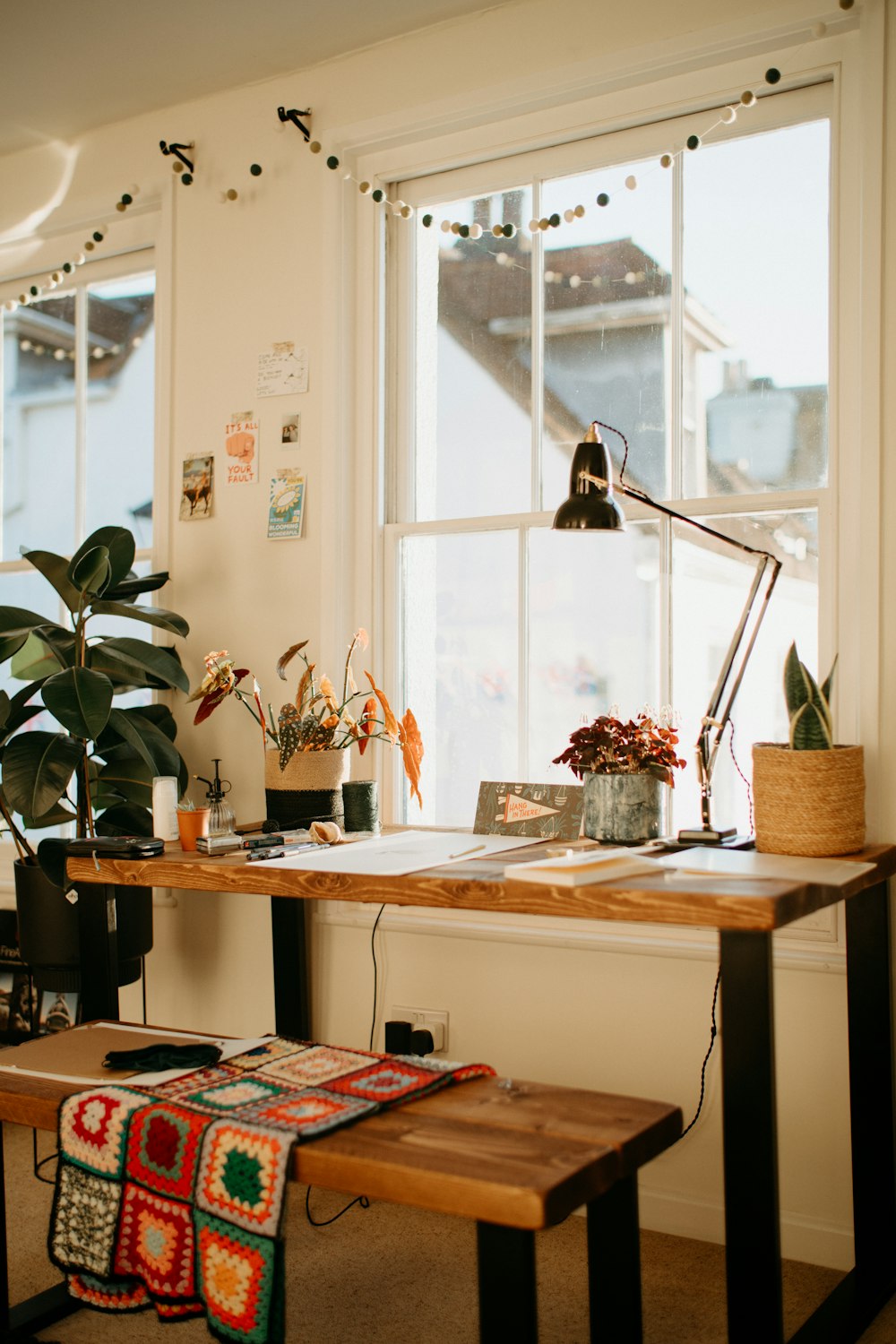 a room filled with furniture and a large window