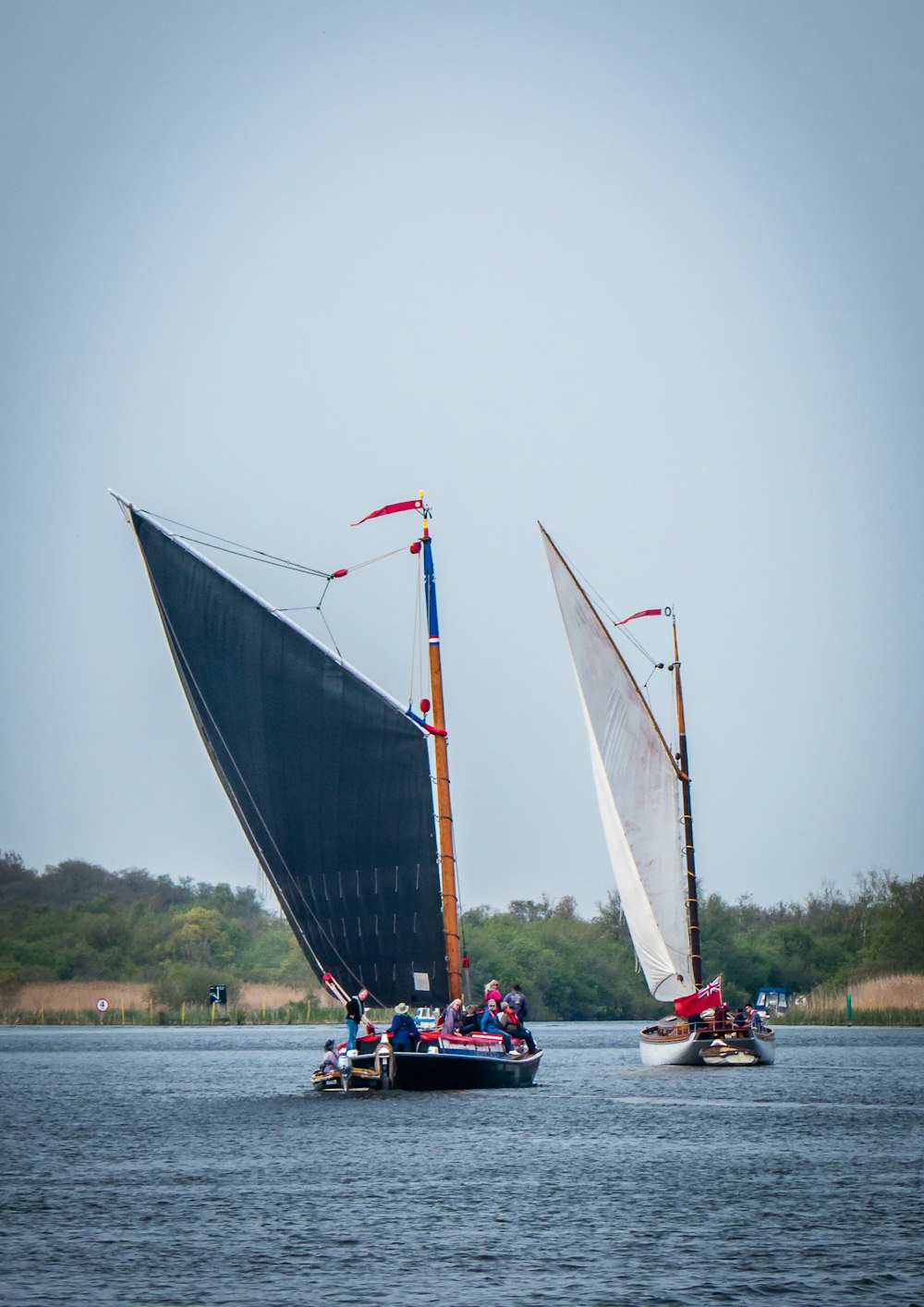 a group of people sailing on a boat