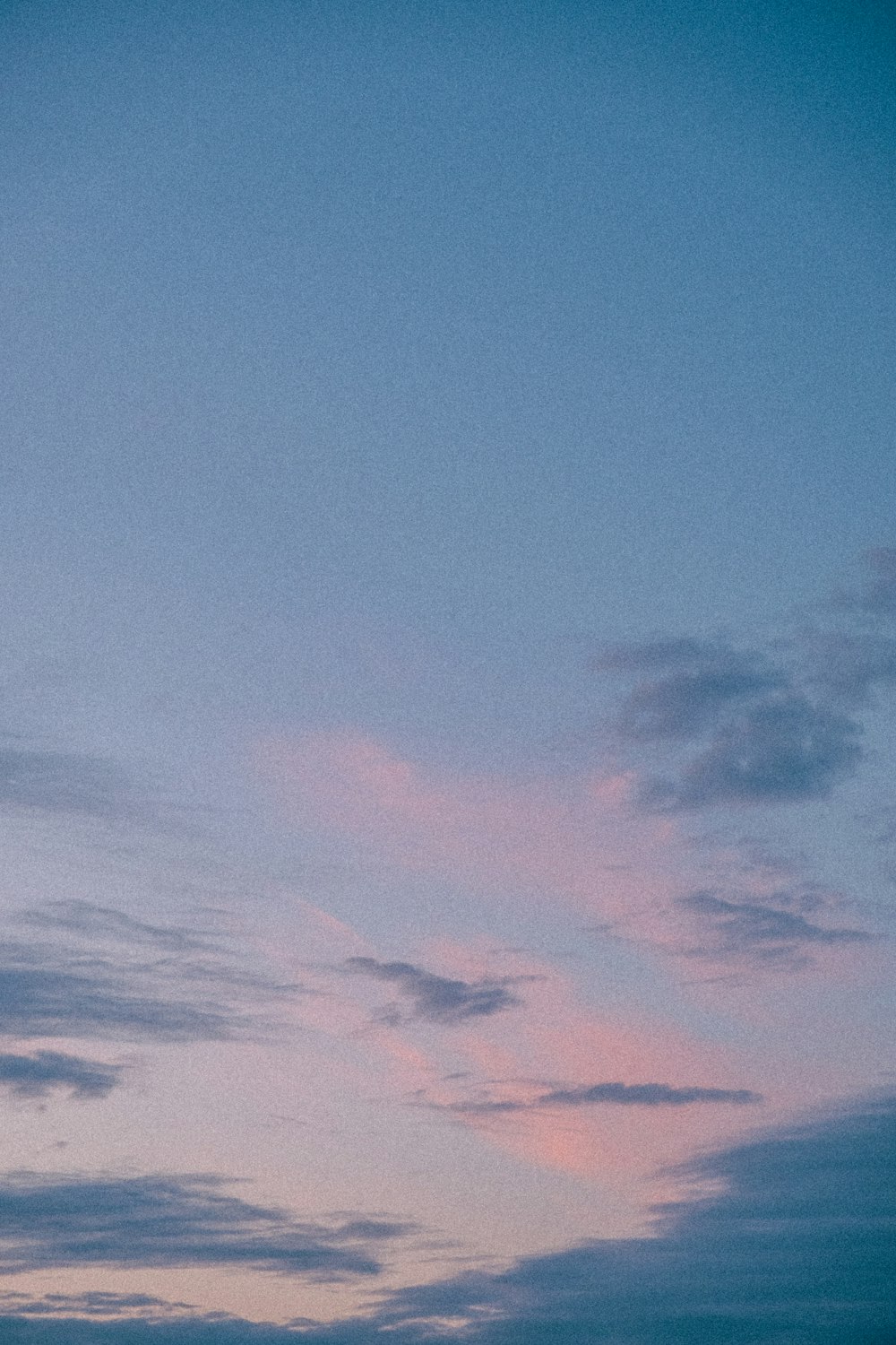 a blue sky with clouds