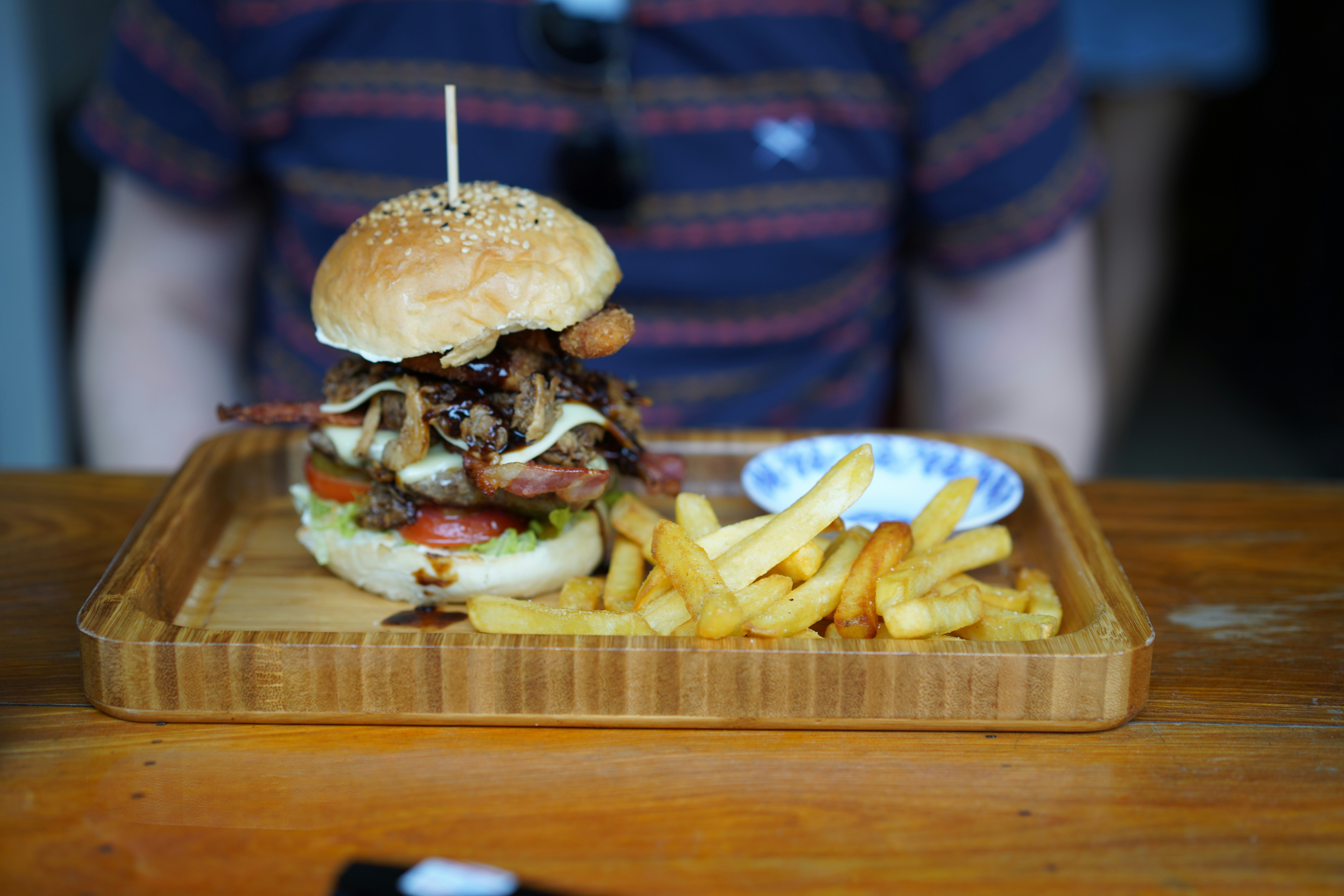a burger and fries on a plate, Burger in Kampot, Cambodia