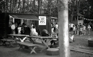 A vibrant photo of a community event in Killarney with families enjoying outdoor activities.