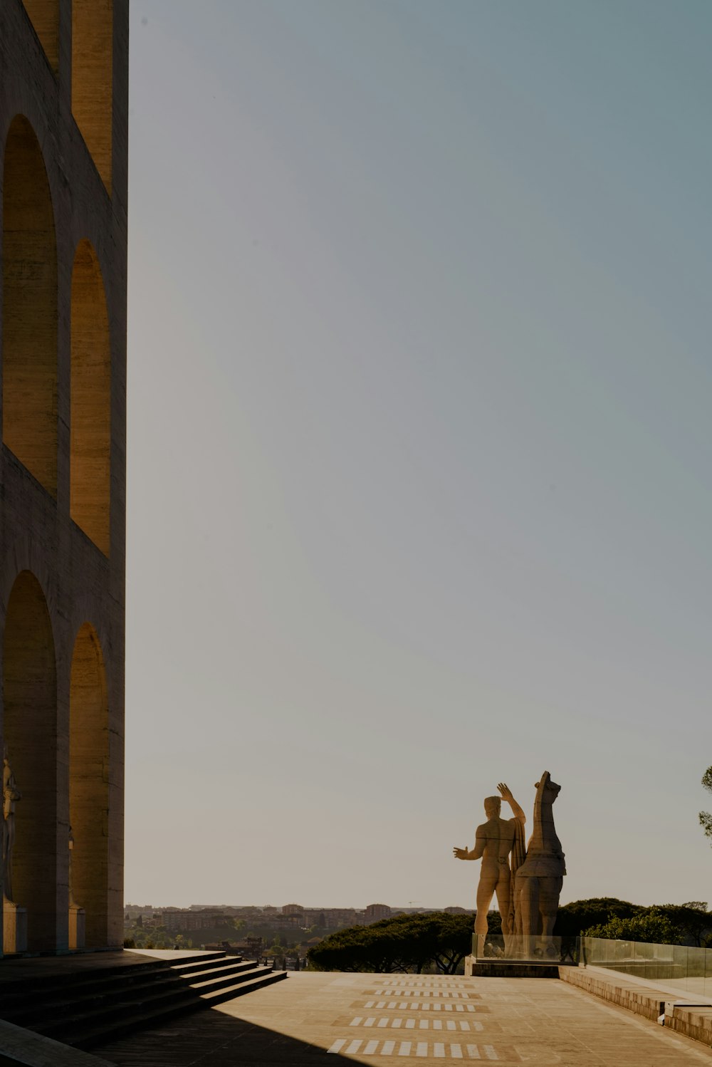 a statue on a bridge