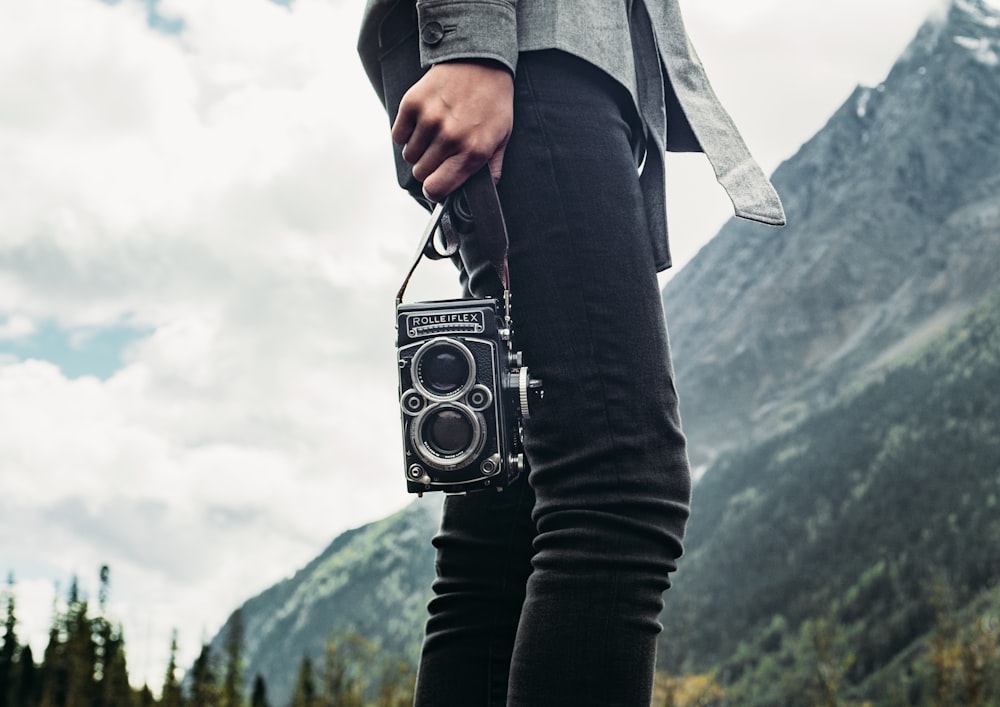 a person holding a camera