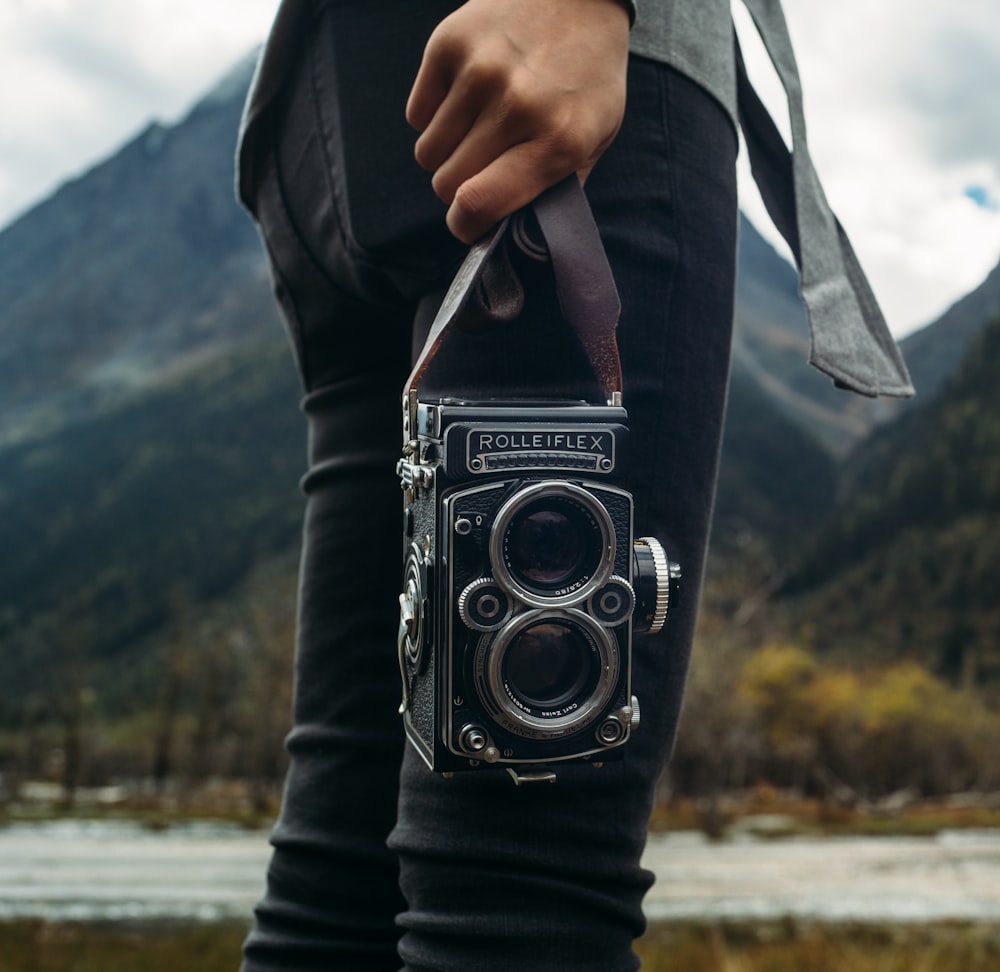 a person holding a camera