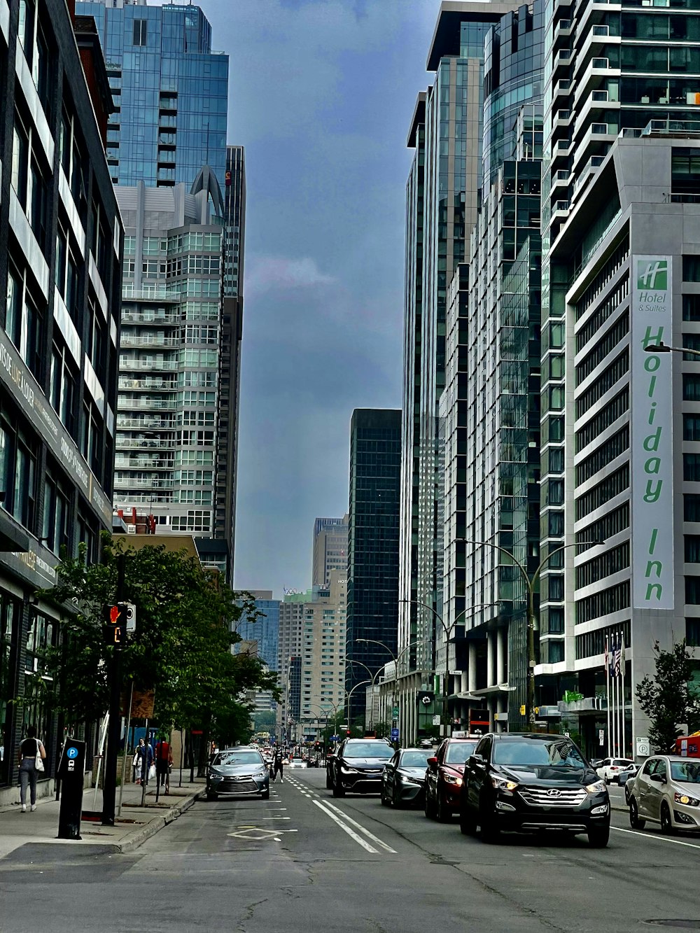 a city street with tall buildings