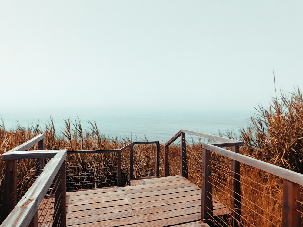 a wooden bridge over water