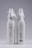 Two elegant white bottles with ribbed texture and decorative cloth tied around the neck with bows. One bottle has embossed text and a cactus design on the front, while the other displays product details and a barcode.