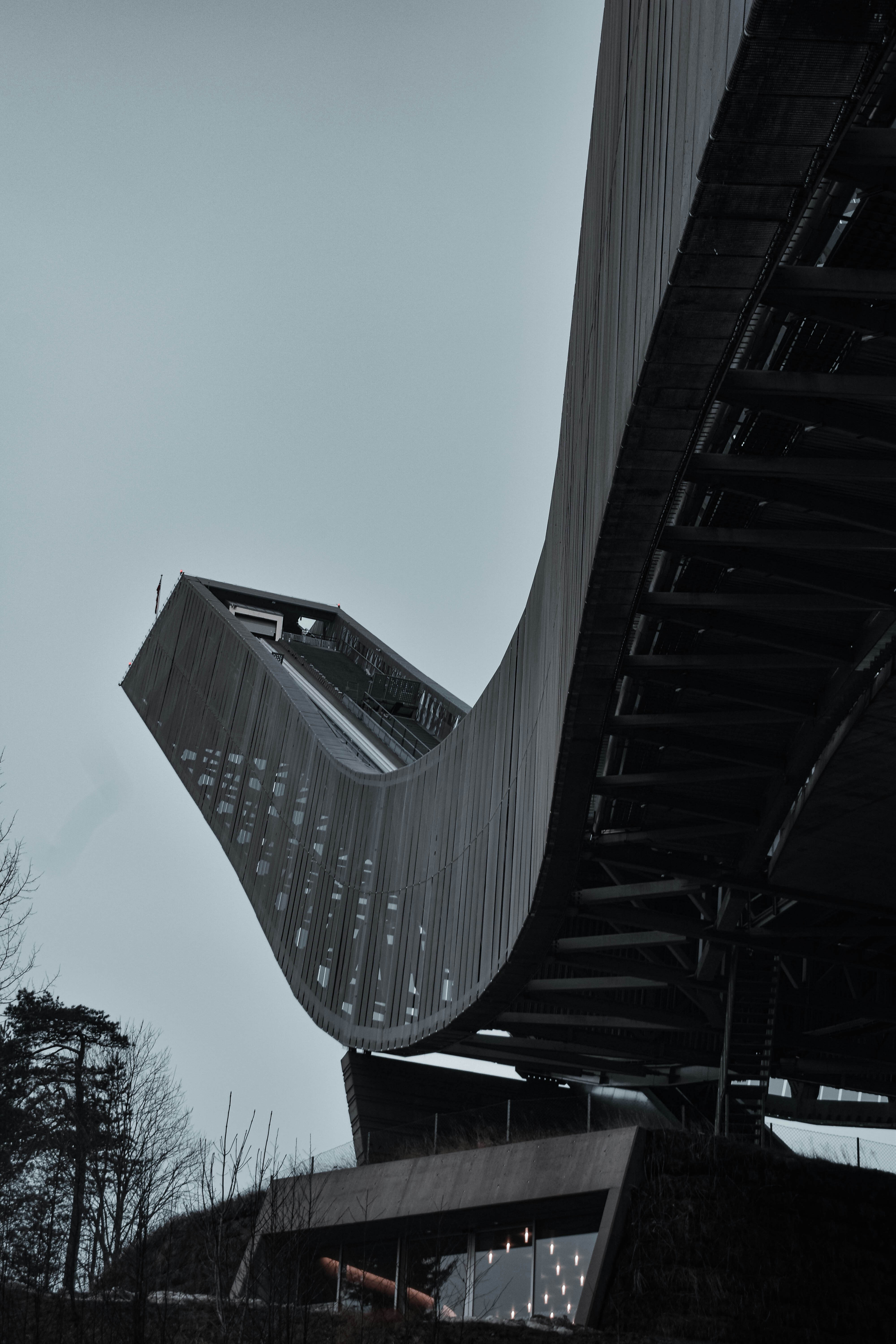 a chair sitting in front of a building