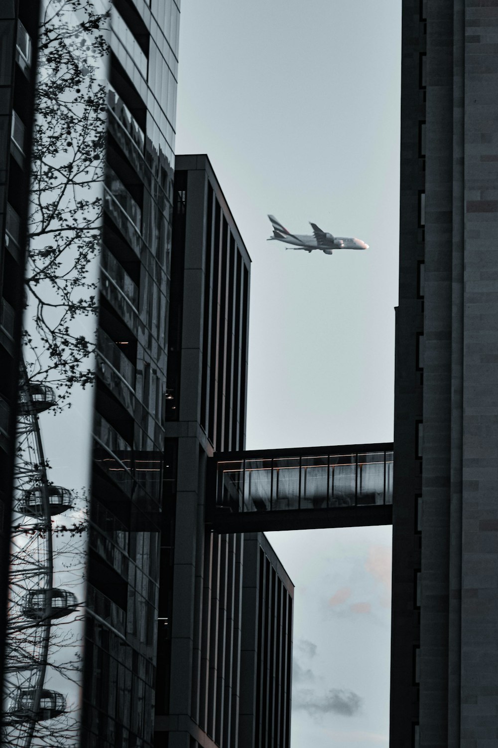 a plane flying over a city