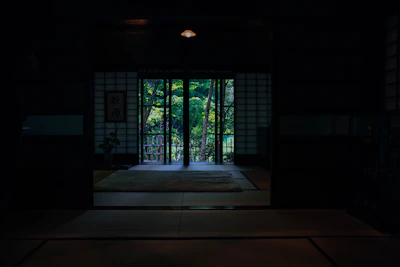 Elegant hotel lobby with traditional Japanese decor and soft lighting.