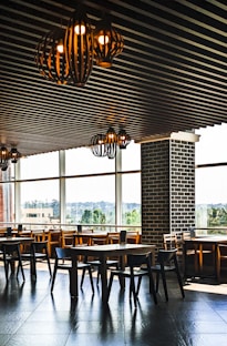 a room with tables and chairs