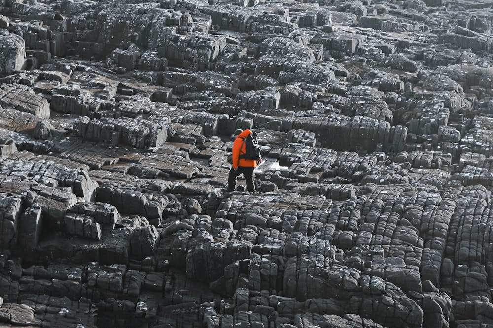 a man standing in a pile of rubble