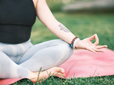 a person sitting on the grass