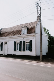 a white house with a red roof