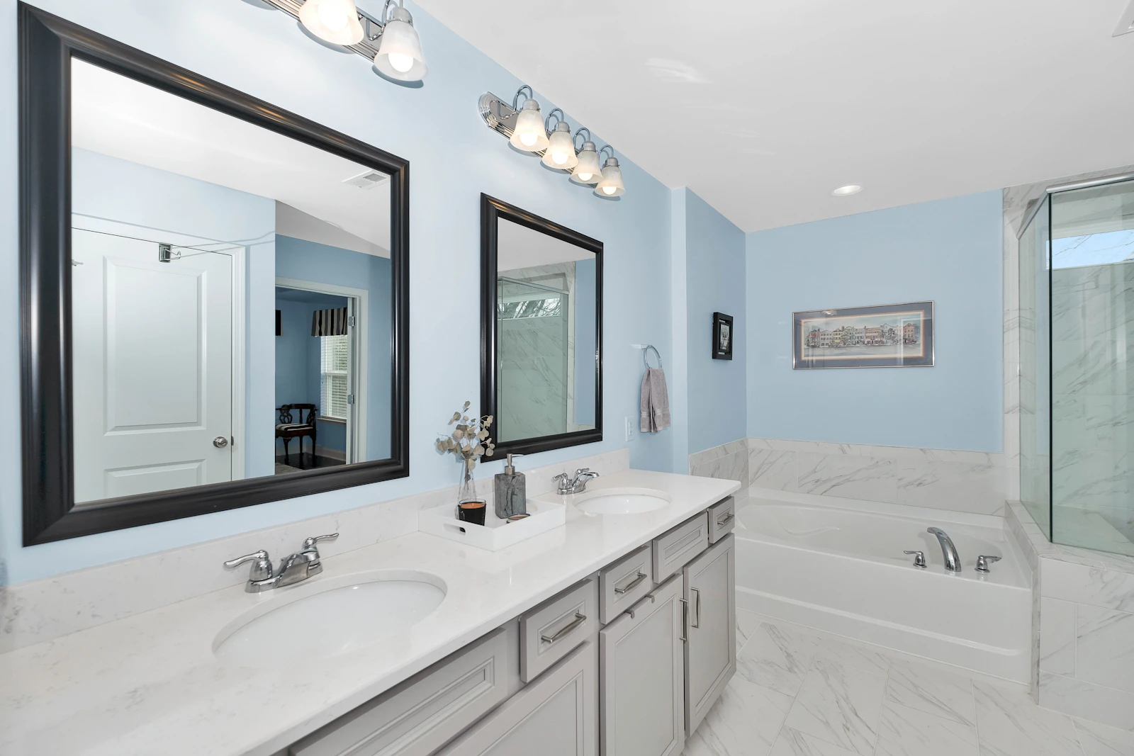 Double-vanity master bath with large mirror