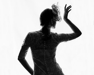 a woman with her hands up