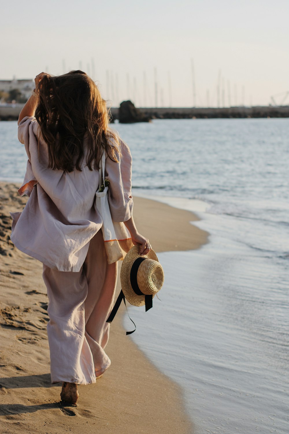 a person walking on a beach