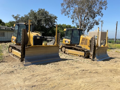 a few yellow construction vehicles