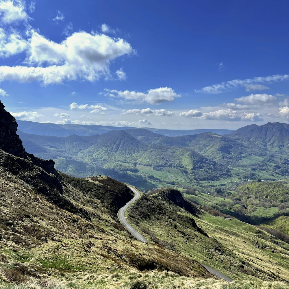 a winding road through a valley