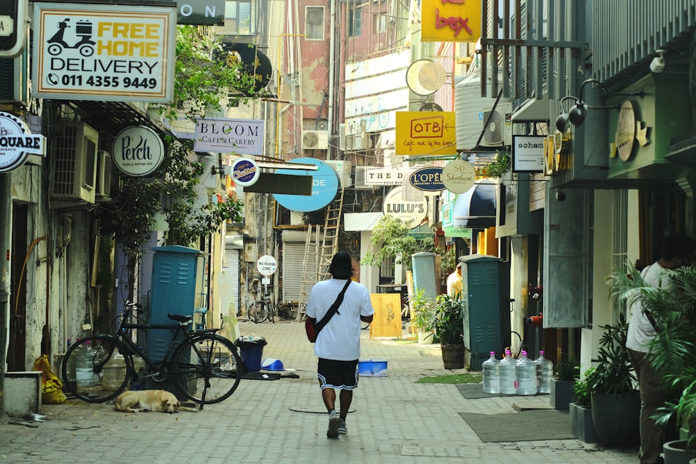 a person walking down a sidewalk