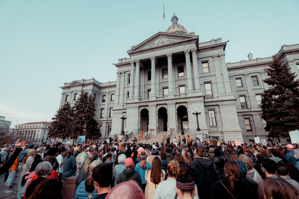 a crowd of people outside a building