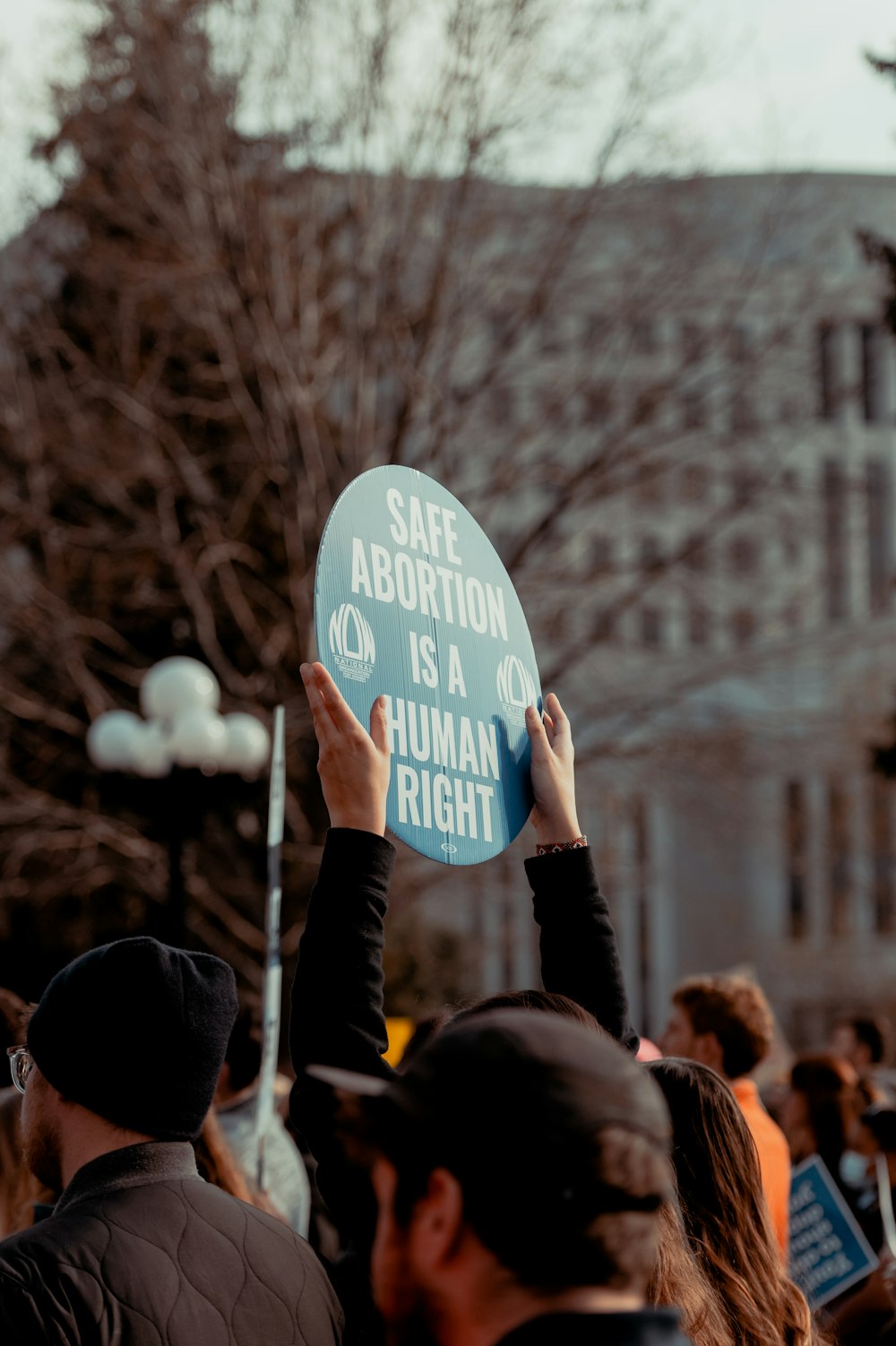 a person holding a sign