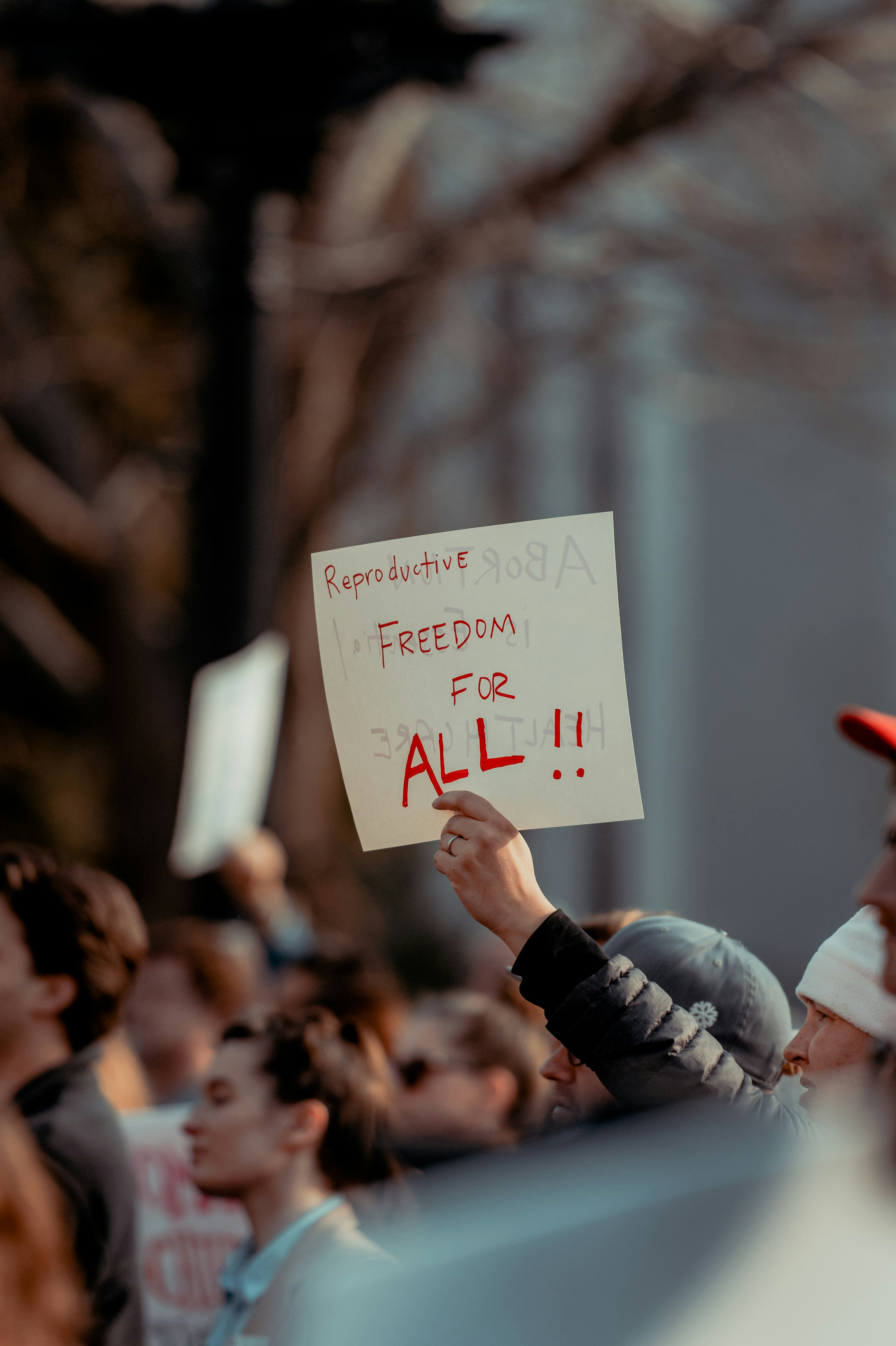 a person holding a sign