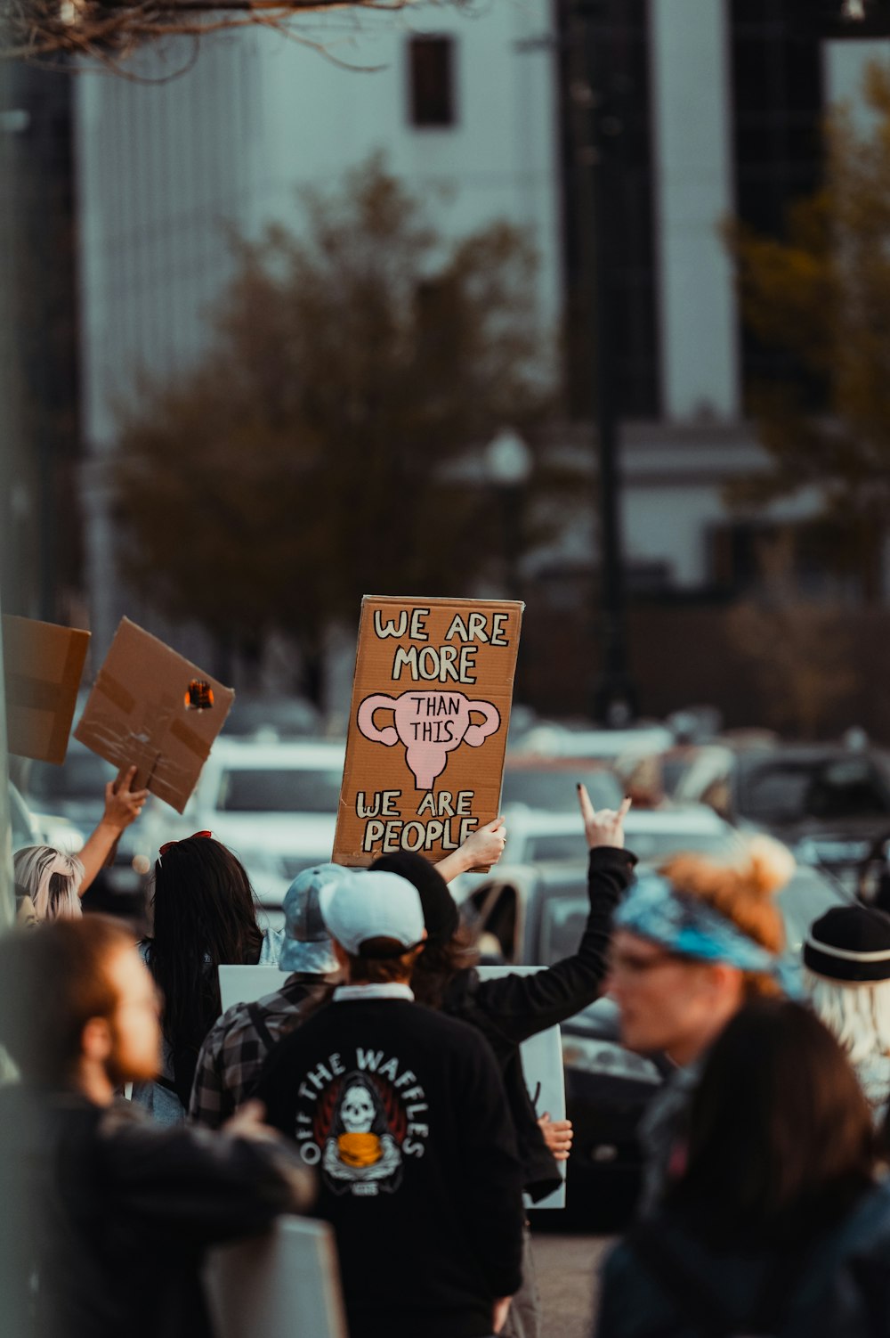 a person holding a sign