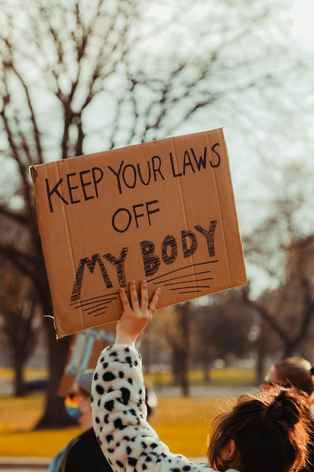 a person holding a sign