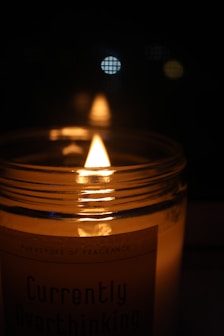 a candle in a glass