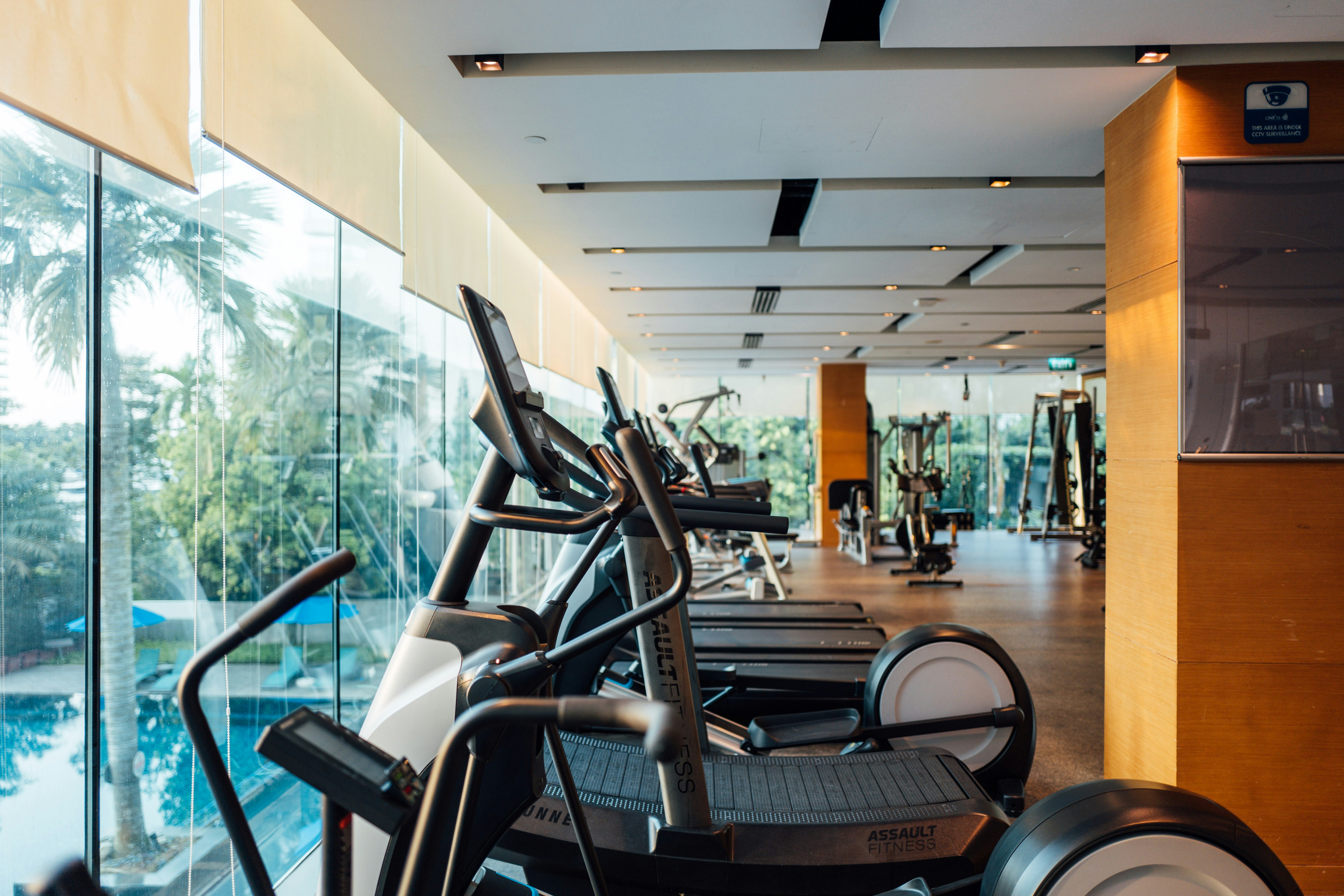 Modern, well-lit fitness center at The Bush Temple, featuring cardio machines, free weights, and strength training equipment - gyms in chicago