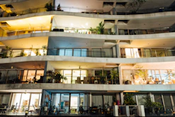 a building with many windows and balconies