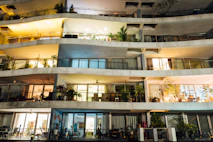 a building with many windows and balconies