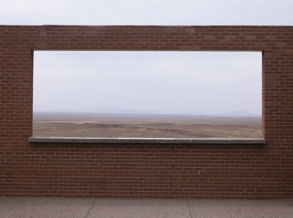 a brick wall with a window