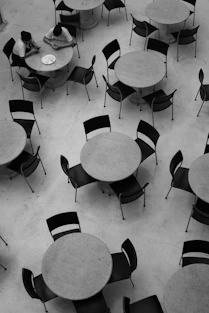 a room with tables and chairs