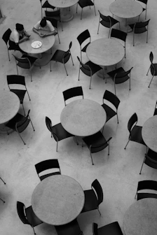 a room with tables and chairs
