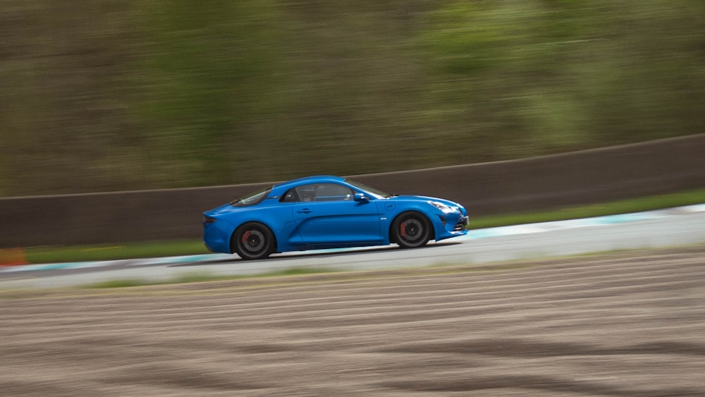 a blue car on a track