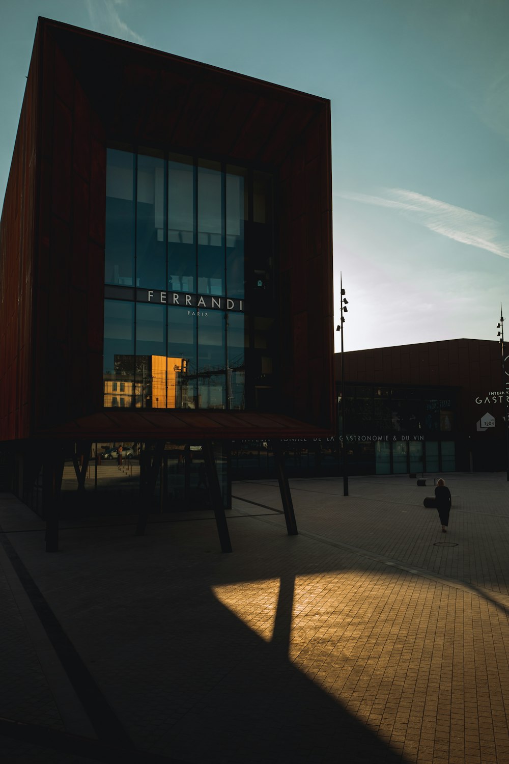 a person walking outside of a building