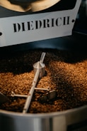 a bucket of dirt and a sign