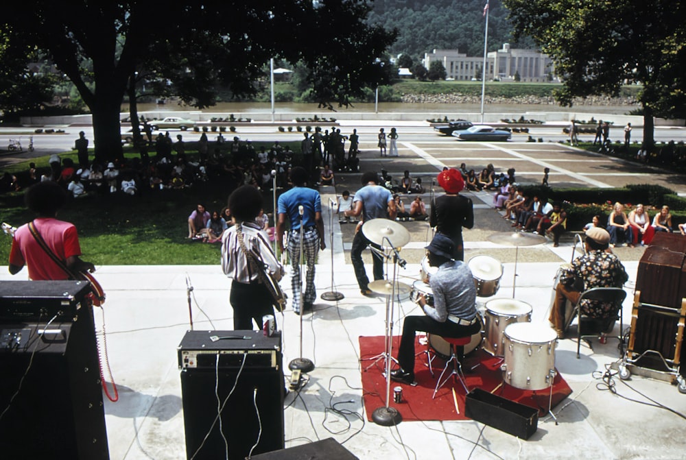 a group of people playing instruments