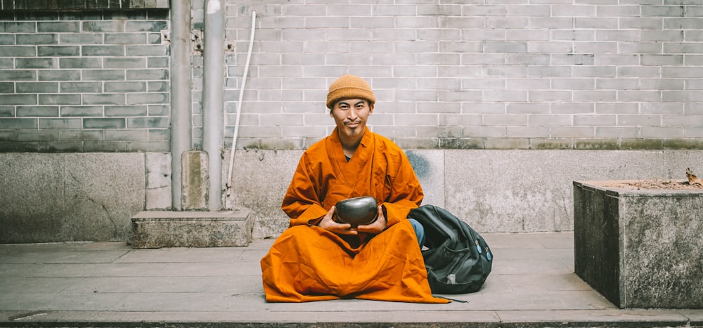 a man sitting on the ground