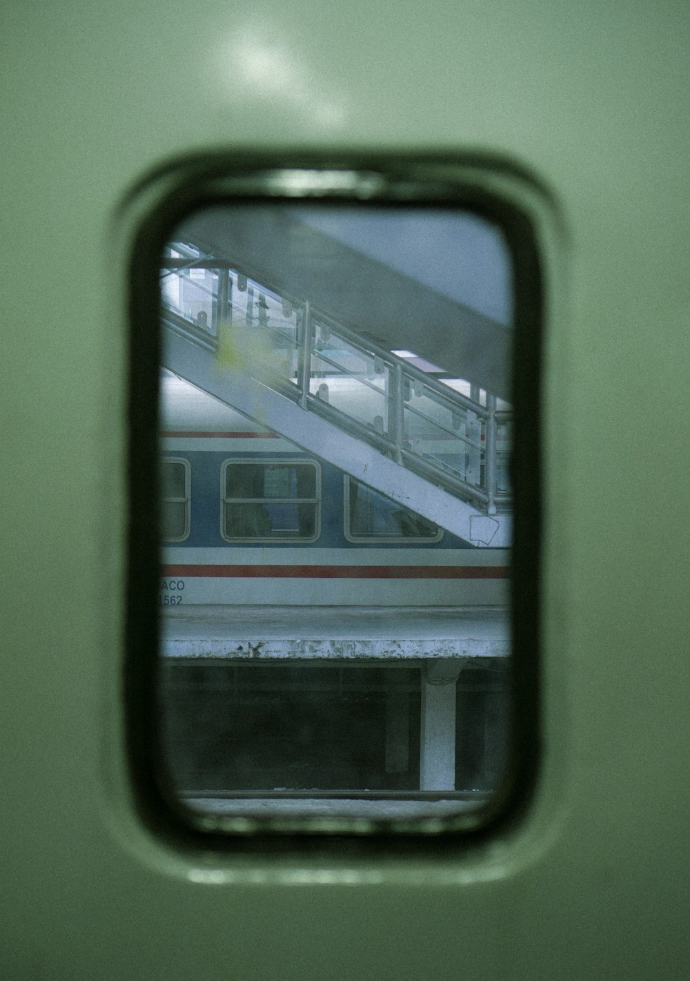 a train is reflected in a mirror