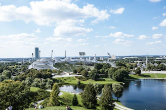 Wide shot of a tensile roof covering a large public plaza.