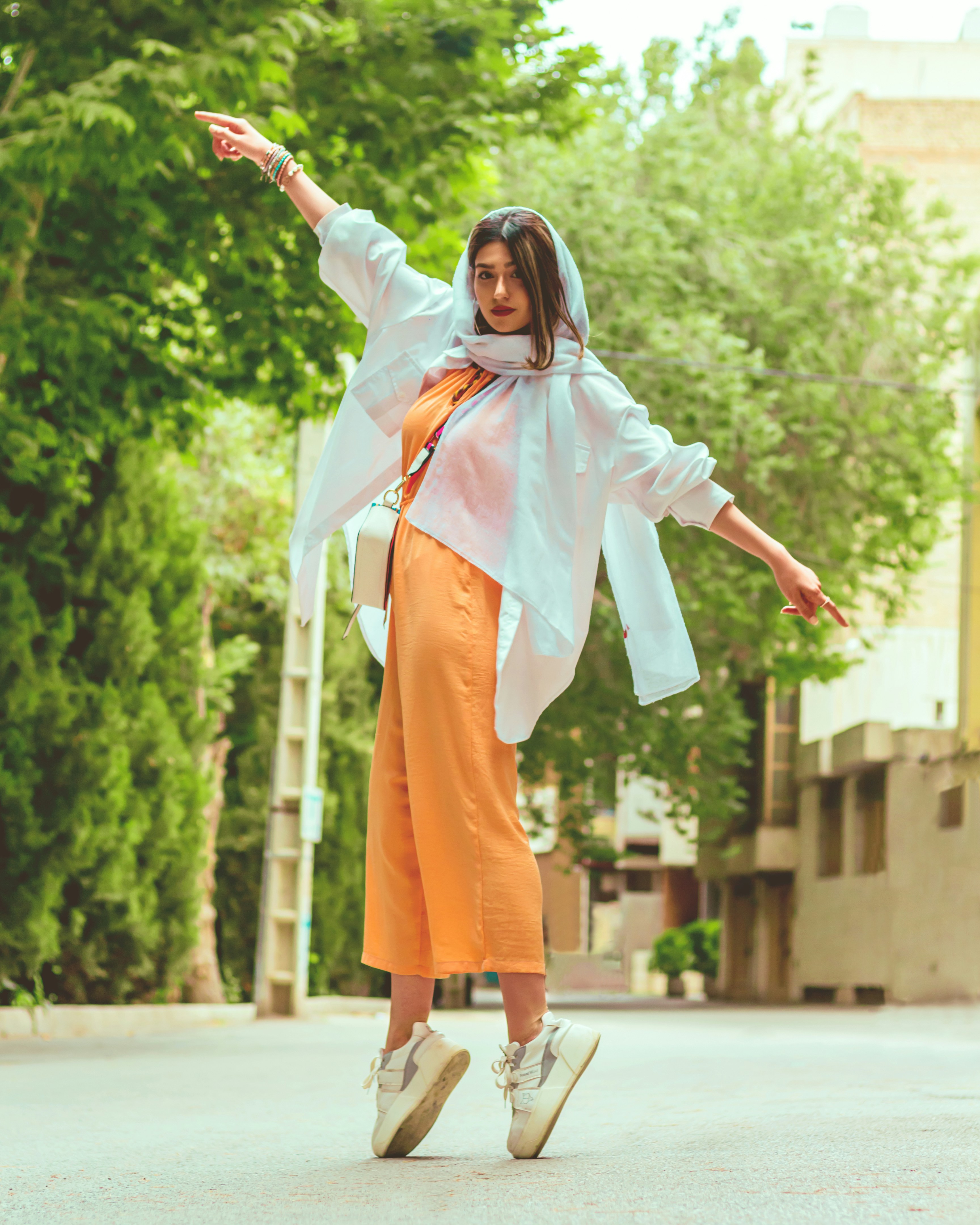 a person in an orange dress