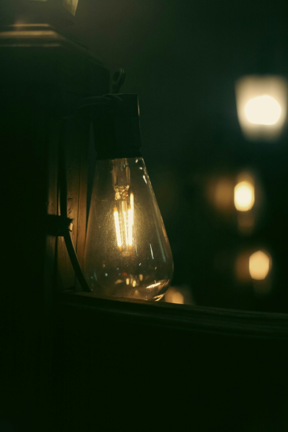 a glass lantern with a light inside