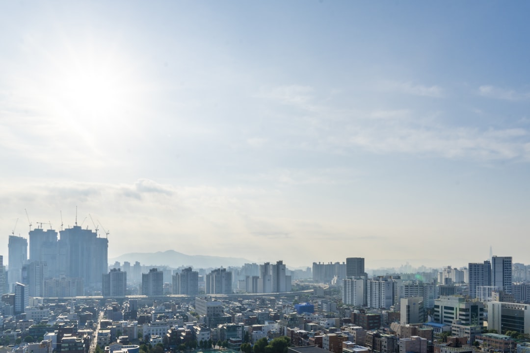a city with a mountain in the background,