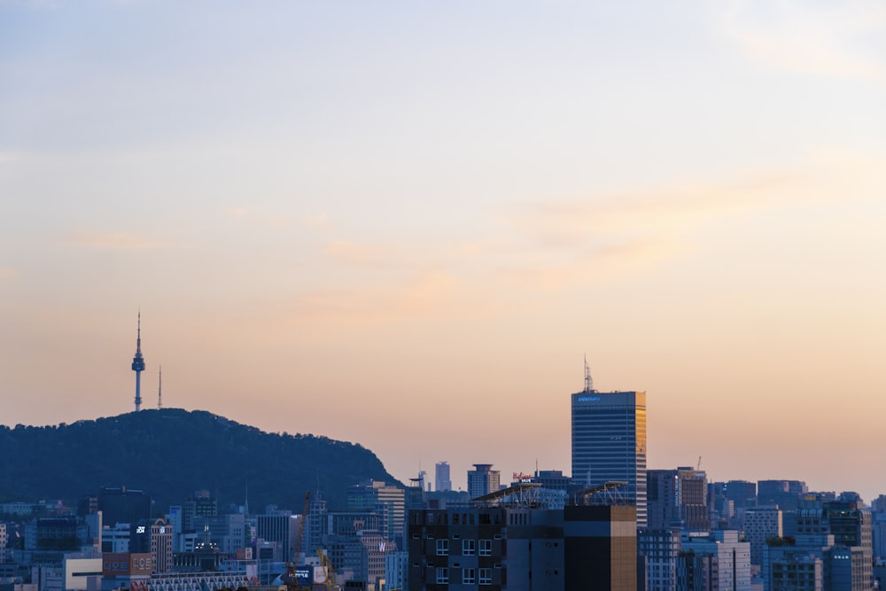 a city with a mountain in the background