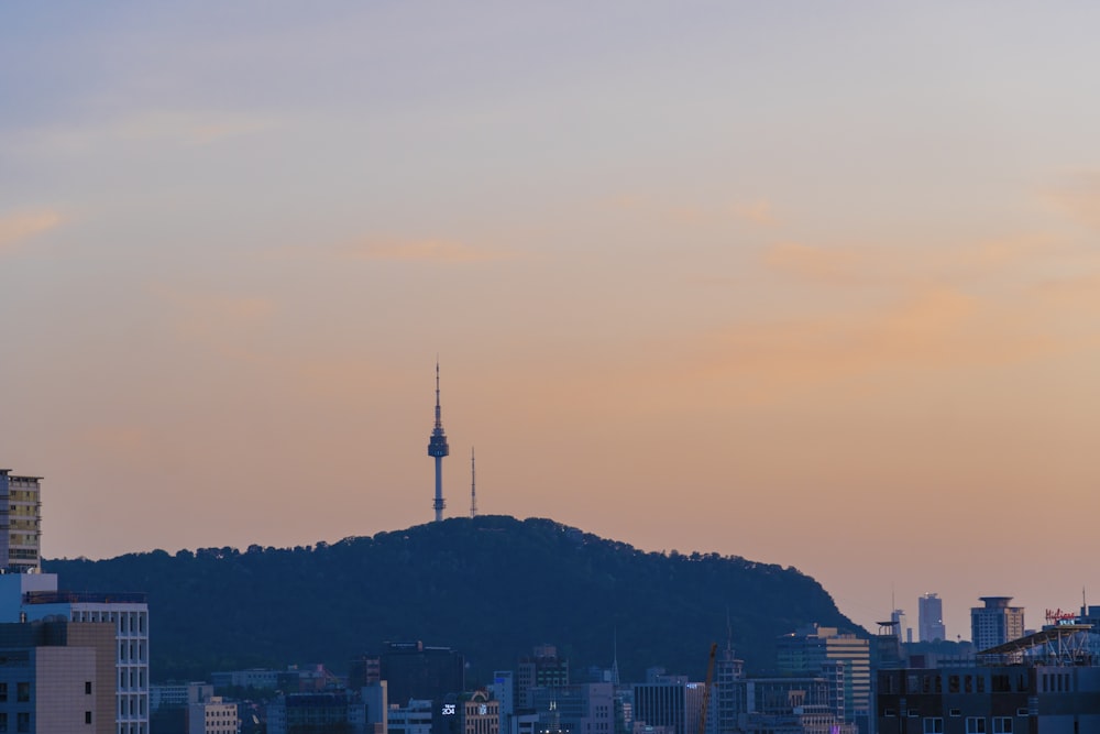 a city with a mountain in the background